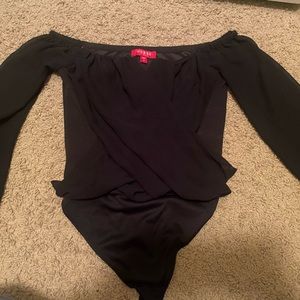 I am selling a black bodysuit from guess